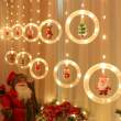 Perdea luminoasă LED - Moș Crăciun - 1,8 x 0,5 m - 125 LED-uri alb cald